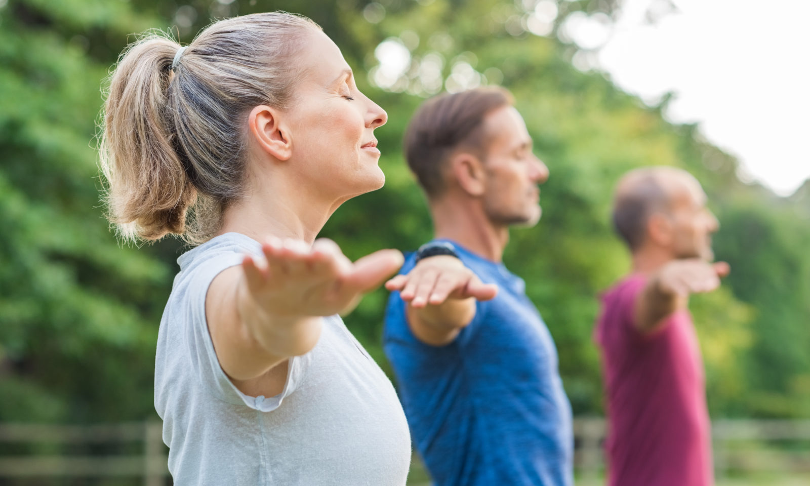Group of people doing yoga
